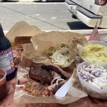 Franklin Barbecue - Pork Ribs (tasty rub, not super tender) Brisket (phenomenally tender and juicy) onions and pickle sides, Single Potato Salad, and coleslaw - Barbeque Near Me - Austin, Texas Franklin Barbecue - Pork Ribs (tasty rub, not super tender) Brisket (phenomenally tender and juicy) onions and pickle sides, Single Potato Salad, and coleslaw - Barbeque Near Me - Austin, Texas