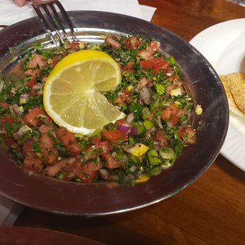 Gyros & Falafel Grill - Tabbouleh salad and pita bread, easily enough for at least two persons. - Mediterranean Near Me - Windsor, Colorado Gyros & Falafel Grill - Tabbouleh salad and pita bread, easily enough for at least two persons. - Mediterranean Near Me - Windsor, Colorado