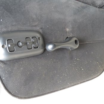 Magic's Auto Upholstery - Foam crumbs, fabric not placed properly around seat controls. - Auto Customization Near Me - Bellflower, California Magic's Auto Upholstery - Foam crumbs, fabric not placed properly around seat controls. - Auto Customization Near Me - Bellflower, California