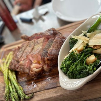 Grille 620 - a steak and asparagus on a cutting board - Seafood Near Me - Ellicott City, Maryland Grille 620 - a steak and asparagus on a cutting board - Seafood Near Me - Ellicott City, Maryland