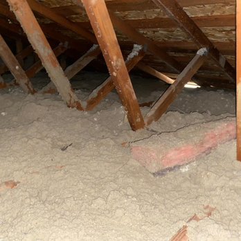Attic Pros - Original attic condition, old 1960s insulation and a few pieces of new insulation from previous remodel. - Pest Control Near Me - Oakland, California