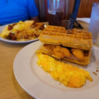 That Flippin' Egg - Chicken and waffles with scrambled cheese eggs and an omelet  with toast. - New American Near Me - Evans, Georgia