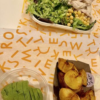 Kismet Rotisserie - Big green salad with a side of S Schmaltzy potatoes and slices of avocado. - Salad Near Me - Pasadena, California