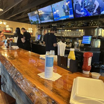 Wow Wing House - Nice natural wood bar. - Chicken Wings Near Me - Cape Coral, Florida