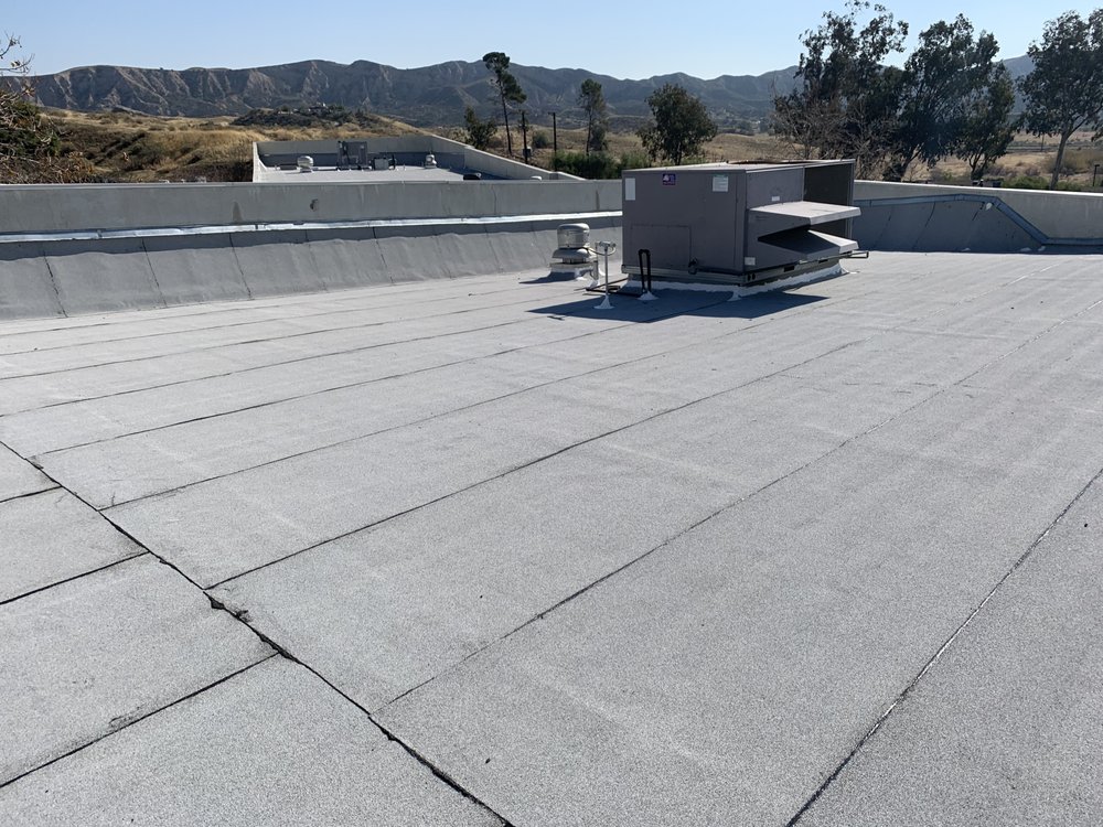 Slide of Espinal's Roofing & Waterproofing