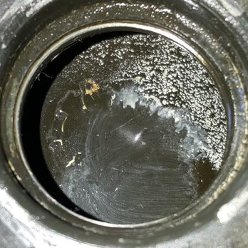 Lambs Auto Center - Close up of engine oil port. Cho and Harry of LAMBS Auto can you tell me what what you are putting in my vehicle? - Tires Near Me - Rowland Heights, California