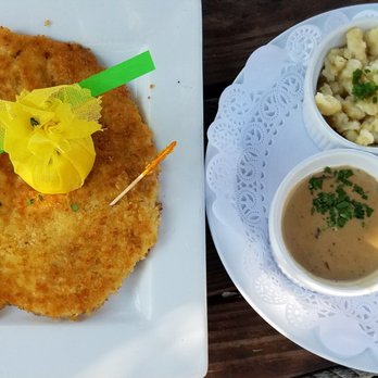 The Hoffmann - Chicken Jaeger schnitzel  (mushroom sauce on the side) with spaetzel and potato salad - German Near Me - Jensen Beach, Florida