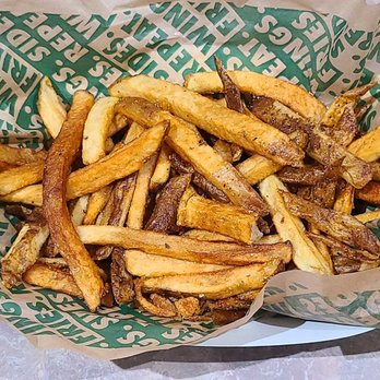Wingstop - Large fries, ordered cooked extra with extra seasoning... better than last time. - Chicken Wings Near Me - Tampa, Florida