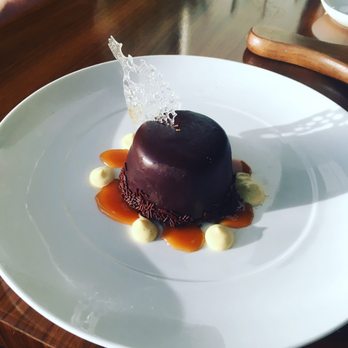 Table 13 - The "Rolo" dome dessert. Very tasty for those who like chocolate and caramel. - Tapas/Small Plates Near Me - Spokane, Washington