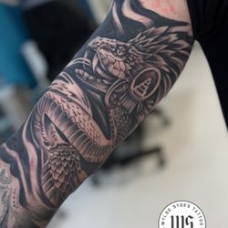 Wylde Sydes Tattoo & Body Piercing - Feathered Serpent
By Jesus Sanchez