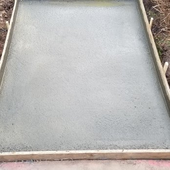 Hunter Excavating - a concrete slab laying on the ground - Landscaping Near Me Hunter Excavating - a concrete slab laying on the ground - Landscaping Near Me