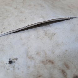 Ricks Mobile RV Roof Repair and Lifetime Coating - This is where Rick originally did the unbounded patch expecting the silicone to hold it. Less than 5 months after he did it.