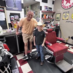 Race Cuts - The coolest barber I have met.  His name is Bruce and he is what you want in a barber.