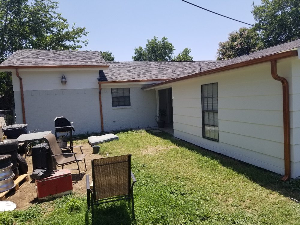 Slide of Humberto's Roofing Service