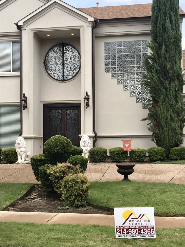 Slide of AM Roofing Company