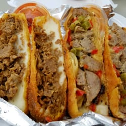 Wheelin' Dealin Food Truck Festival - Philly cheese steak and sausage and peppers fried egg rolls from World Famous food truck.