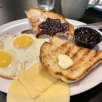 Hilltop Cafe Bistro - A la carte two eggs with toast, cheese and Marion-berry compote - Cafes Near Me - Waldport, Oregon