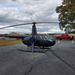 Independent Helicopters - The R44 we had the privilege to fly and Nick the instructor.