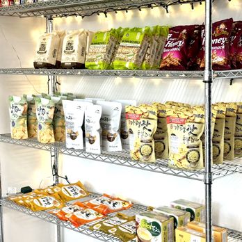 Frostails - a shelf of snacks and snacks - Shaved Snow Near Me - Gilbert, Arizona