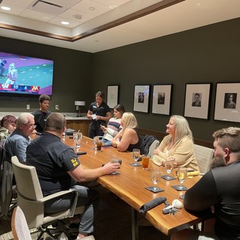 Bump’s Restaurant - Conference room with a TV... cheering on Minnesota to win so the Hawks will advance to the Big Ten Conference Championship!  ( they won!) - New American Near Me - Iowa City, Iowa