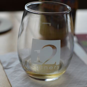 12 Corners Vineyards - a glass of wine on a napkin - Wineries Near Me - Benton Harbor, Michigan 12 Corners Vineyards - a glass of wine on a napkin - Wineries Near Me - Benton Harbor, Michigan