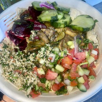 Abba's Hummus - Vegan bowl with a bed of hummus, with mushrooms & caramelized onions, with various salads. - Delis Near Me - Oakland, California