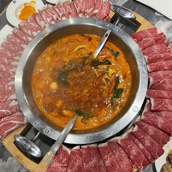 Liuyishou Hotpot - Tomato soup base with beef and lamb plate - Chinese Near Me - Chicago, Illinois Liuyishou Hotpot - Tomato soup base with beef and lamb plate - Chinese Near Me - Chicago, Illinois