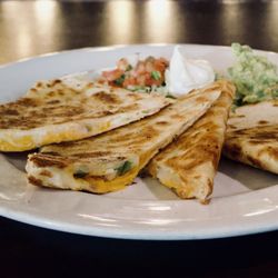 Monty's Public House - Cheese quesadillas, add chicken Tinga, black bean burger, or ground beef