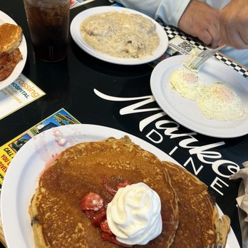 Marko's Diner - Chocolate chip pancakes with strawberry and whip-cream - Breakfast & Brunch Near Me - Fort Myers, Florida Marko's Diner - Chocolate chip pancakes with strawberry and whip-cream - Breakfast & Brunch Near Me - Fort Myers, Florida