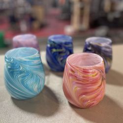 High Gravity Glassworks - One of our customer's favorite product lines, the feathered wine glass. Available for purchase in the gallery.