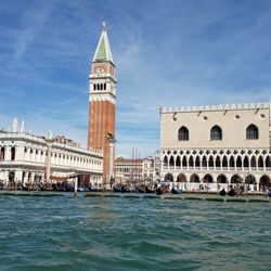 Vibrant Travel - St Mark's Square and Doge's Palace from the lagoon in Venice Italy