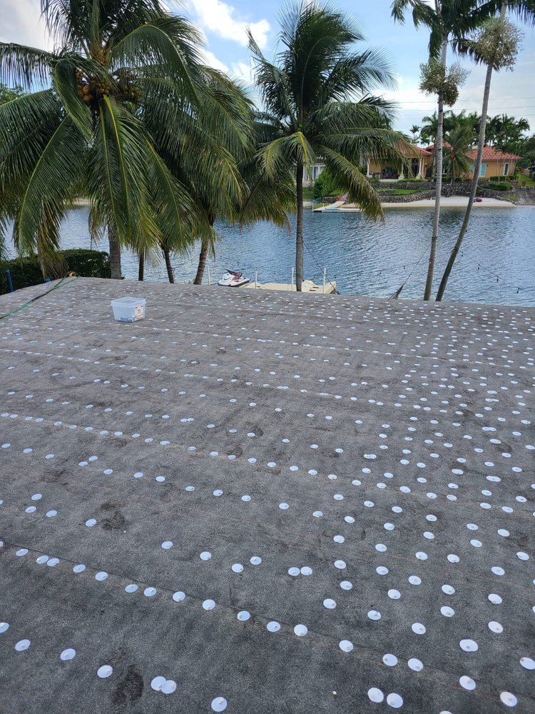 Slide of D-Tech Roofing