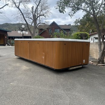 Soul Spa Movers - Swim spa in original location coming down the driveway. - Movers Near Me - Garden Grove, California