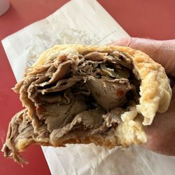 Very chewy bite, bottom of roll fell apart.