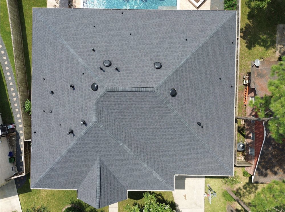 Slide of Noble Roofing