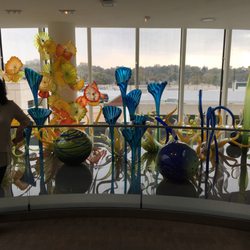 Fred & Pamela Buffett Cancer Center - Em in front of her glass garden.