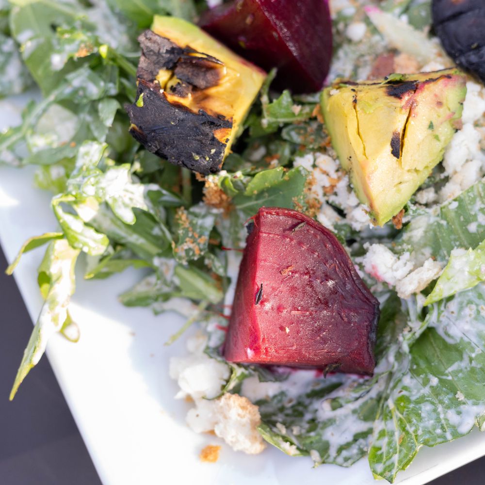 Arabian Grill - Beets caesar salad - charred avocado, beets, capers, lettuce, and cotija cheese - Syrian Near Me - Long Beach, California Arabian Grill - Beets caesar salad - charred avocado, beets, capers, lettuce, and cotija cheese - Syrian Near Me - Long Beach, California