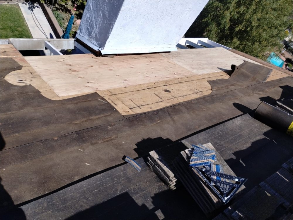 Slide of Kalli Roofing