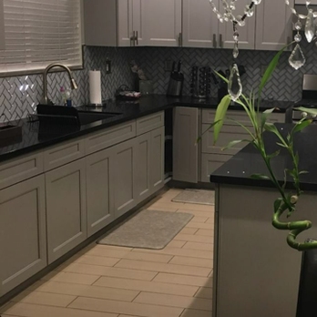 EC Construction - a kitchen with a chandelier hanging from the ceiling - General Contractors Near Me - Moreno Valley, California EC Construction - a kitchen with a chandelier hanging from the ceiling - General Contractors Near Me - Moreno Valley, California