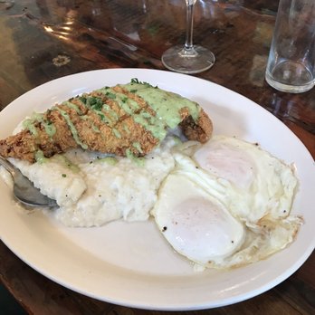 Toast - Catfish with Grits and sunny side up eggs with tarragon aioli. - Breakfast & Brunch Near Me - New Orleans, Louisiana Toast - Catfish with Grits and sunny side up eggs with tarragon aioli. - Breakfast & Brunch Near Me - New Orleans, Louisiana