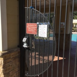 hand made a sign WARNING you...'We ask that absolutely NO food or drinks be brought in or around the pool." hand made a sign WARNING you...'We ask that absolutely NO food or drinks be brought in or around the pool."