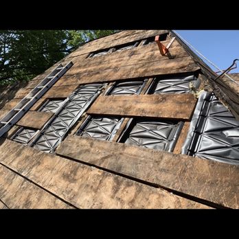 Peak Roofing - These boards on this downtown Hamilton home hadn't seen the light of day in close to 100 years or more. Repairs were needed badly! - Roofing Near Me - Hamilton, Ontario Peak Roofing - These boards on this downtown Hamilton home hadn't seen the light of day in close to 100 years or more. Repairs were needed badly! - Roofing Near Me - Hamilton, Ontario