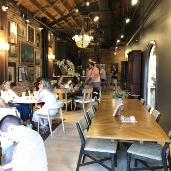 The Parlour - people sitting at tables in a restaurant - Cocktail Bars Near Me - Glen Ellyn, Illinois