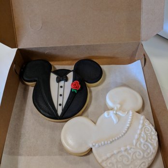 Sweet Themes Bakery - Our custom wedding cookies Sweet Themes surprised us with! AMAZING! We still have the Mickey groom in the freezer. He's too cute to eat! - Bakeries Near Me - Kent, Washington Sweet Themes Bakery - Our custom wedding cookies Sweet Themes surprised us with! AMAZING! We still have the Mickey groom in the freezer. He's too cute to eat! - Bakeries Near Me - Kent, Washington