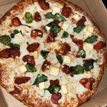 Pizza N Curry - medium Indian tandoori pizza with tandoori sauce, tandoori chicken, spinach, garlic, & paneer - Indian Near Me - Shorewood, Wisconsin Pizza N Curry - medium Indian tandoori pizza with tandoori sauce, tandoori chicken, spinach, garlic, & paneer - Indian Near Me - Shorewood, Wisconsin