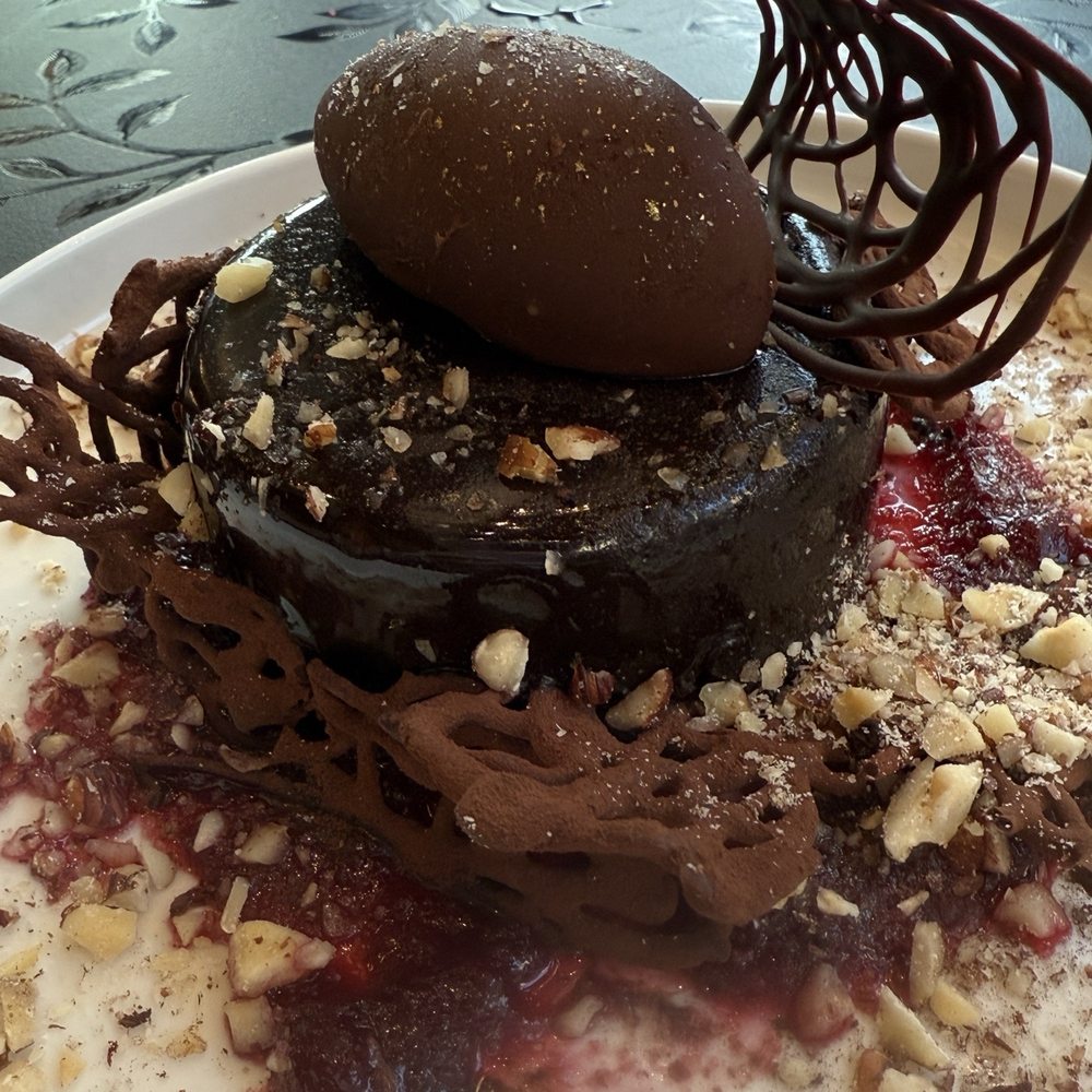 Palm Palm - Dark Desire dessert, which had a chocolate mousse and cherry jelly filling, not as dense as your normal GF chocolate desserts. - Bars Near Me - Pittsburgh, Pennsylvania Palm Palm - Dark Desire dessert, which had a chocolate mousse and cherry jelly filling, not as dense as your normal GF chocolate desserts. - Bars Near Me - Pittsburgh, Pennsylvania