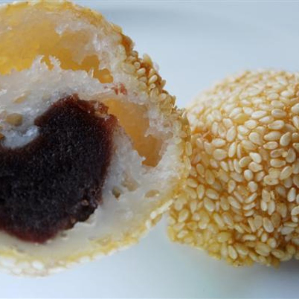 Wong Wong Bakery - Sweet bean ball, cut in half so you can see the filling - highly recommended! - Bakeries Near Me - Manchester, XGM Wong Wong Bakery - Sweet bean ball, cut in half so you can see the filling - highly recommended! - Bakeries Near Me - Manchester, XGM