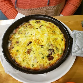 Cafe Elena - Spanish Frittata Skillet Mixture of Roasted Homestyle , , Ham, Mozzarella & feta , Garnished w/Smoked Spanish Paprika - Cafes Near Me - Columbus, Ohio Cafe Elena - Spanish Frittata Skillet Mixture of Roasted Homestyle , , Ham, Mozzarella & feta , Garnished w/Smoked Spanish Paprika - Cafes Near Me - Columbus, Ohio