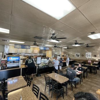 The Berrock Shop - customers eating at the counter - Specialty Food Near Me - Fresno, California The Berrock Shop - customers eating at the counter - Specialty Food Near Me - Fresno, California