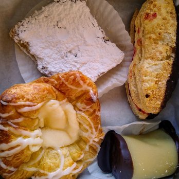 Mona's Danish Bakery - Clockwise from top: lemon bar, French waffle, marzipan truffle, cheese danish - Bakeries Near Me - Tucson, Arizona Mona's Danish Bakery - Clockwise from top: lemon bar, French waffle, marzipan truffle, cheese danish - Bakeries Near Me - Tucson, Arizona